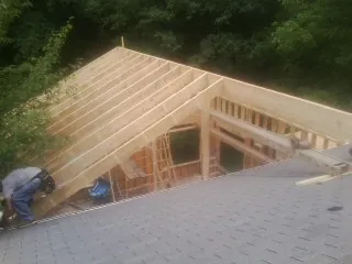 Framing a new roof addition that ties into an existing shingle roof in Quincy